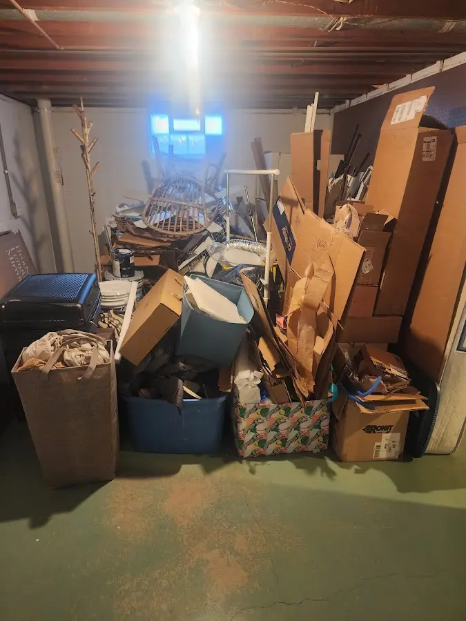 Roll-off dumpster container at job site for Cleanout Dumpster Rental in Ogden